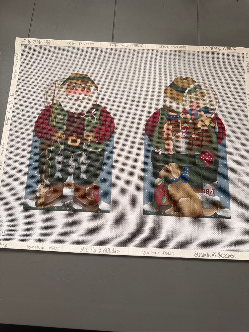 hand-painted needlepoint canvas fishing Santa Claus  by Melissa Shirley.🐈‍⬛